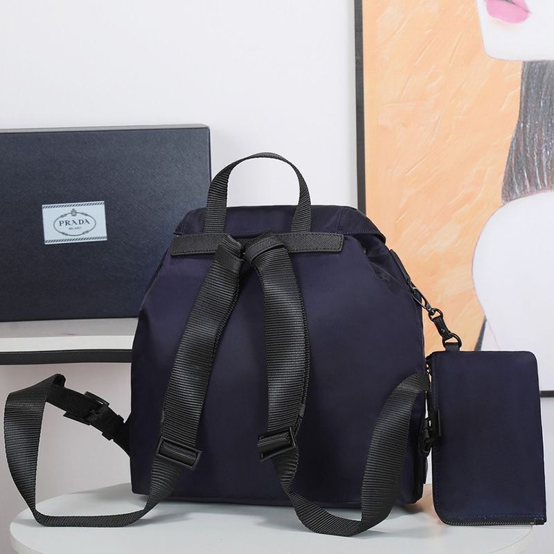 Prada 1BZ811 Re-Nylon Medium Backpack In Blue/Red