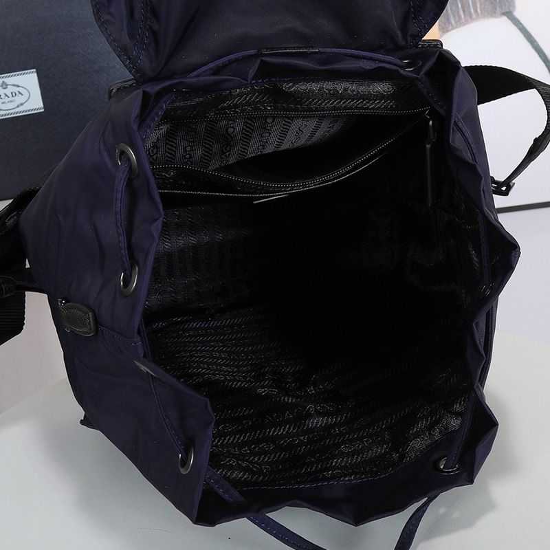 Prada 1BZ811 Re-Nylon Medium Backpack In Blue/Red