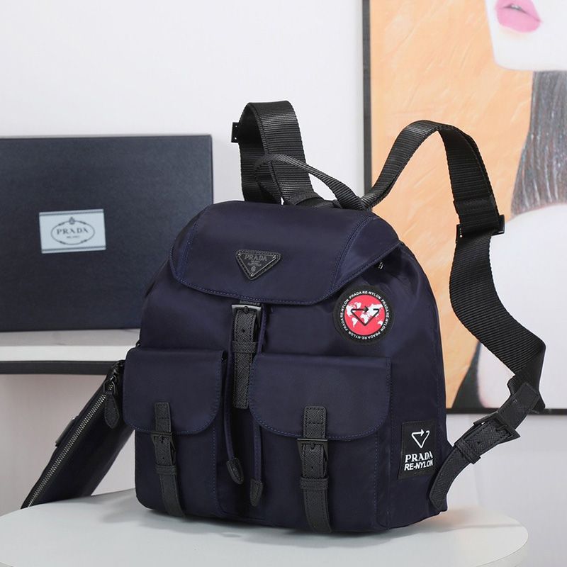 Prada 1BZ811 Re-Nylon Medium Backpack In Blue/Red