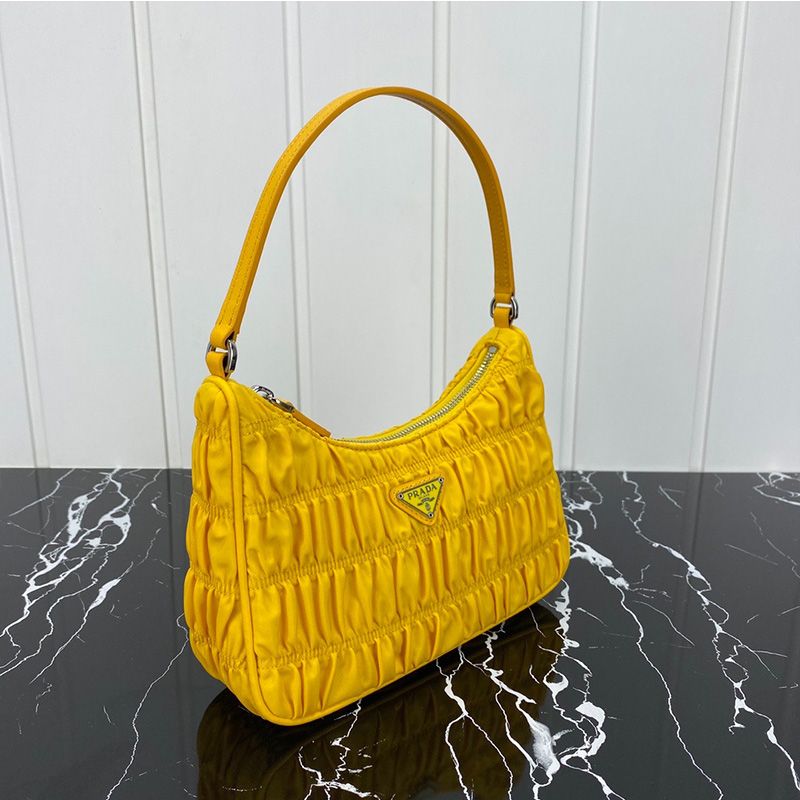 Prada 1NE204 Re-Edition 2005 Quilted Nylon Hobo Bag In Yellow