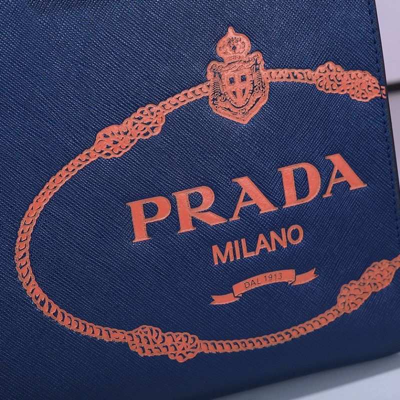 Prada 2VG039 Silk-screened Logo Saffiano Leather Briefcase In Blue/Orange